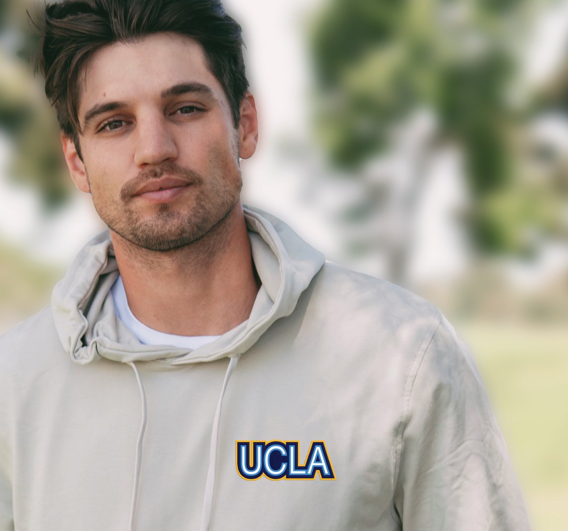 Model wearing a cream UCLA hoodie