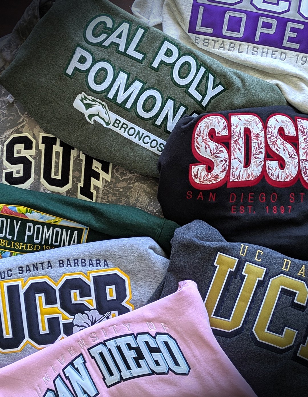 Collection of school sweatshirts with tackle twill and embroidery